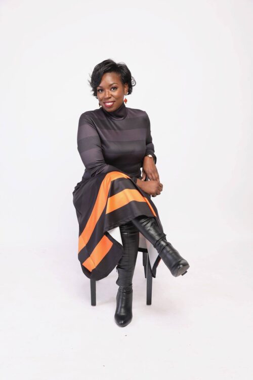 UniteWI Founder and Executive Director Bria Grant sitting for a posed photo