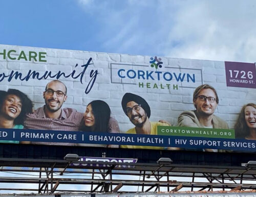 A billboard advertising Corktown Health's service offerings