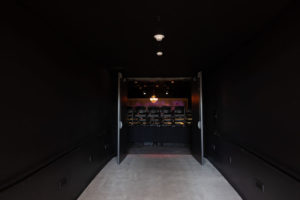 A "light and sound lock" room leading into the black-box performance space in Detroit Pubic Avenue's Third Avenue Garage