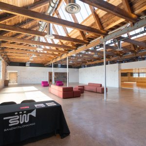 Interior of a building's lobby, with a table reading 