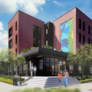 A rendering of a modern red brick building with a glass entrance and colorful mural is depicted, featuring people gathered at the steps and landscaped greenery surrounding the area.