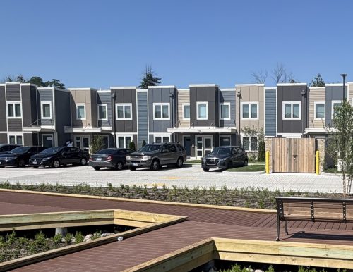 an exterior image of a multi-until two-level housing development